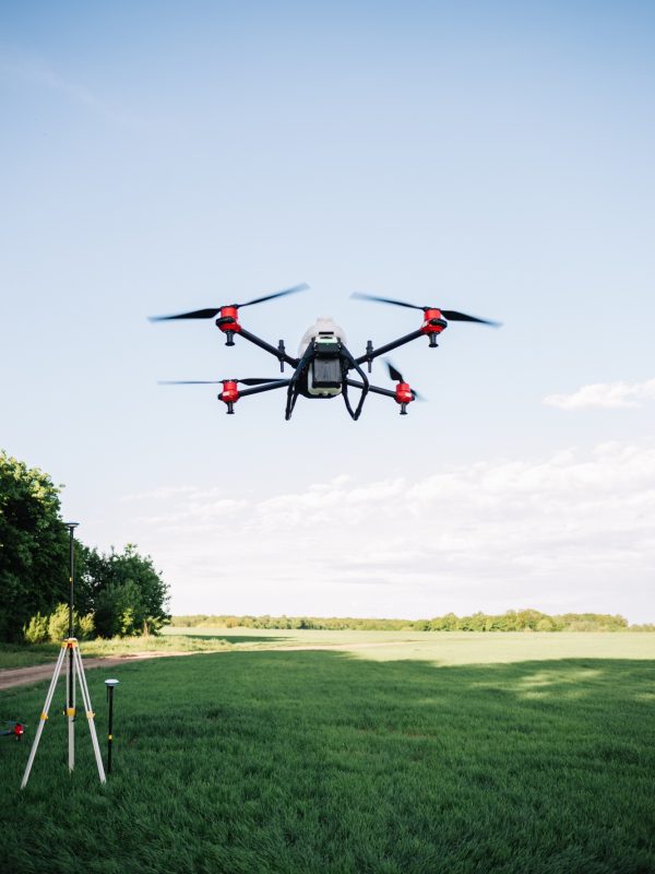 Agriculture drone fly to sprayed fertilizer on the rice fields. Industrial agriculture