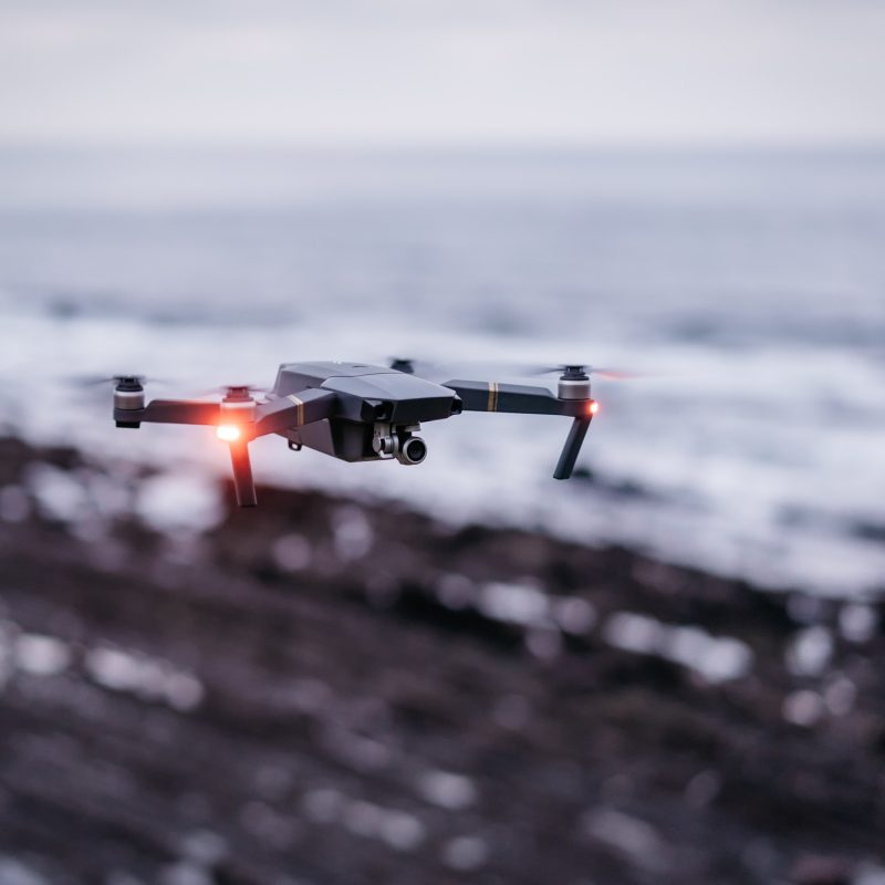 Drone flying near sea